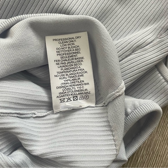 Tibi Ribbed Knit Button Snap Front Point Collared Polo Bodysuit in Light Blue - Picture 11 of 12